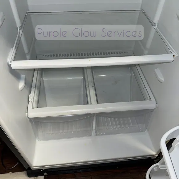 Empty refrigerator interior washed down with clean glass shelves during a move-out cleaning in Murfreesboro, TN
