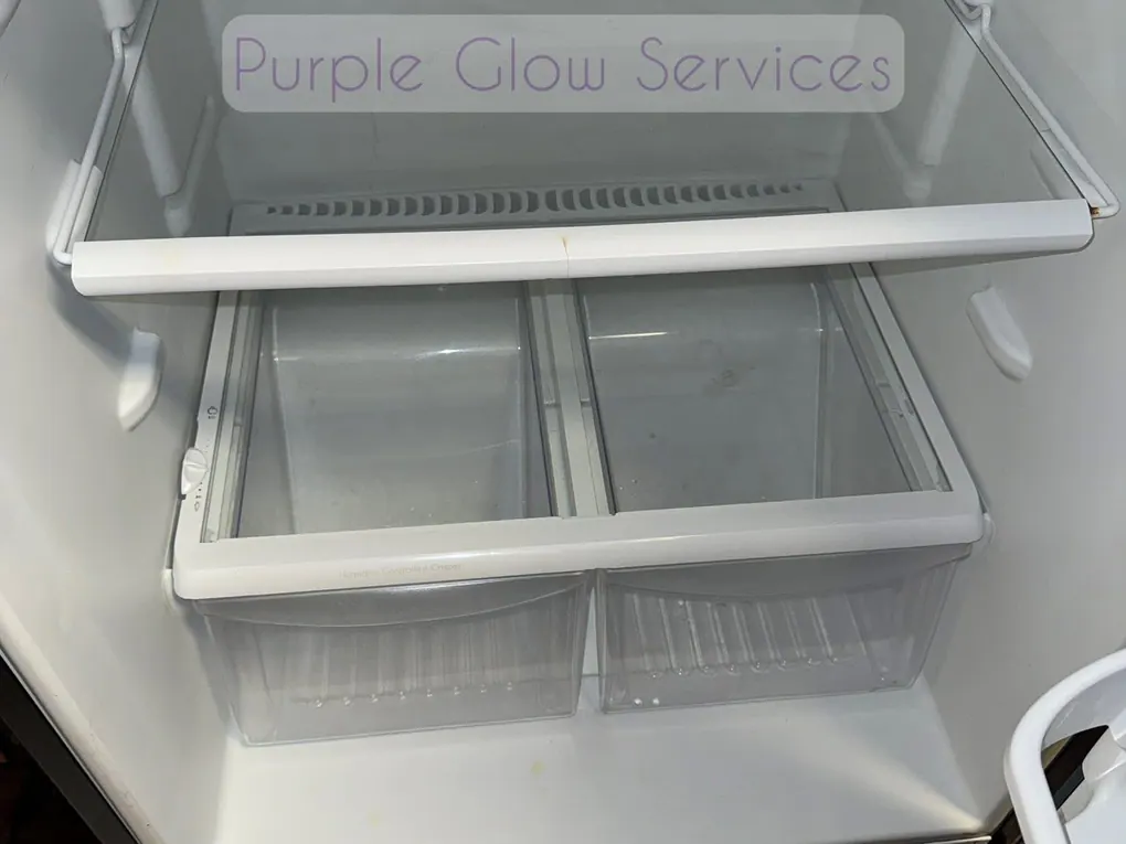 Empty refrigerator interior washed down with clean glass shelves during a move-out cleaning in Murfreesboro, TN