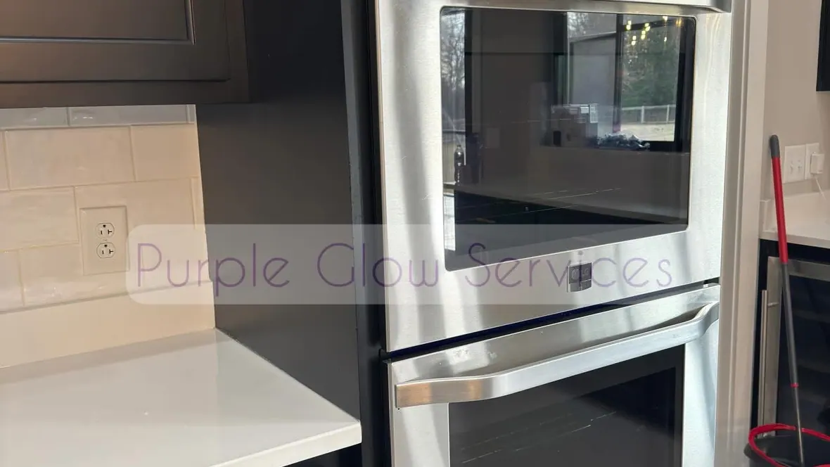 Stainless double wall oven and quartz countertop polished during a deep kitchen clean in Middle Tennessee