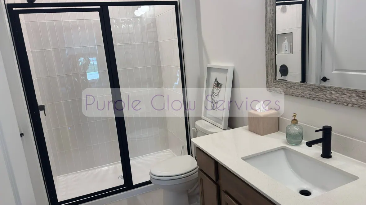 Clean bathroom with streak-free shower glass, mirror and vanity after a house cleaning in Smyrna, TN